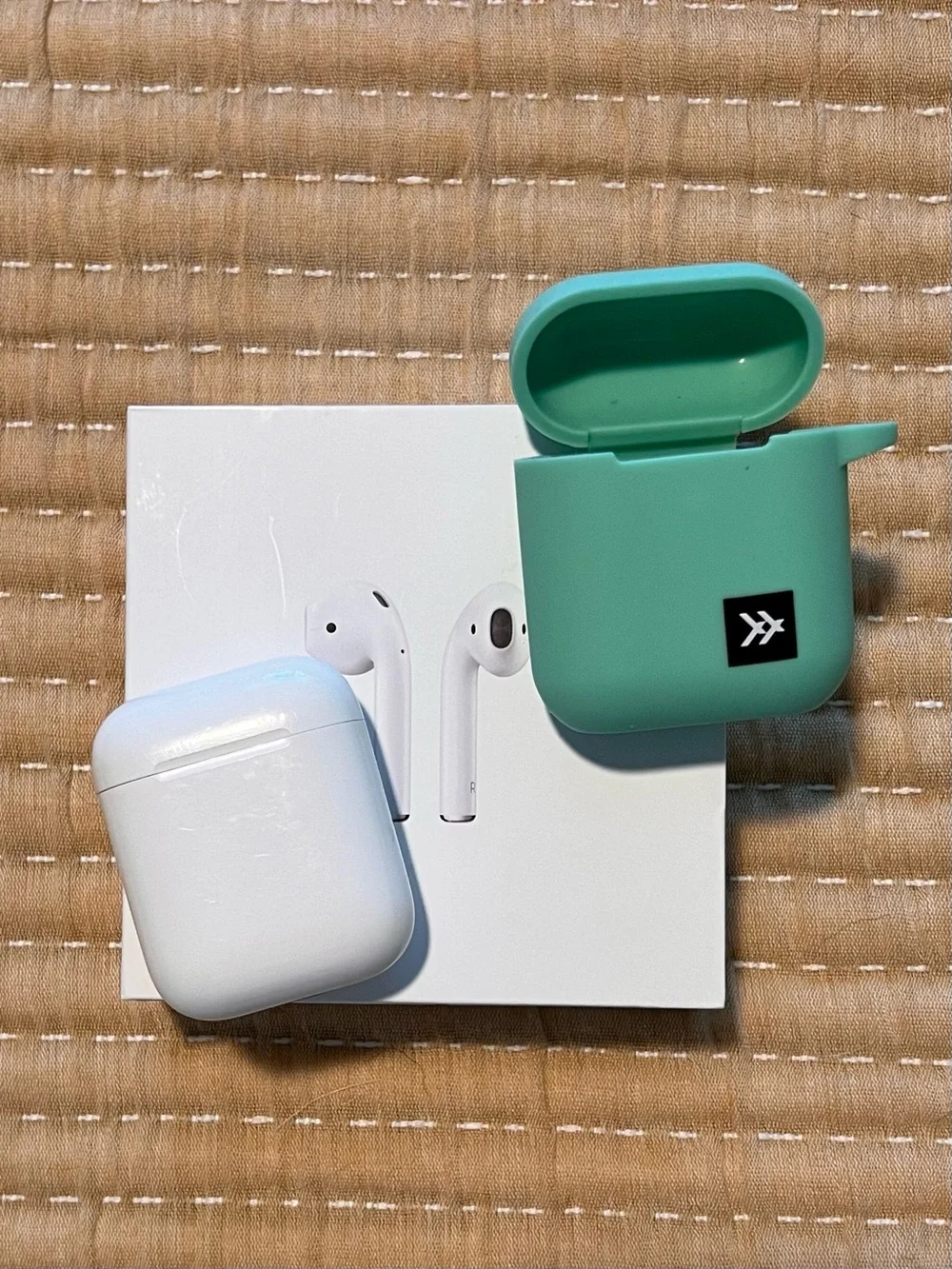 Apple AirPods Gen 2 with White Case and Mint Green Silicone Cover